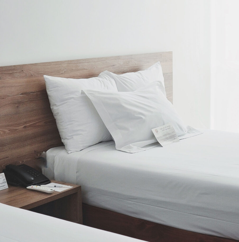 Clean sheets and pillows to prevent lice in an Airbnb